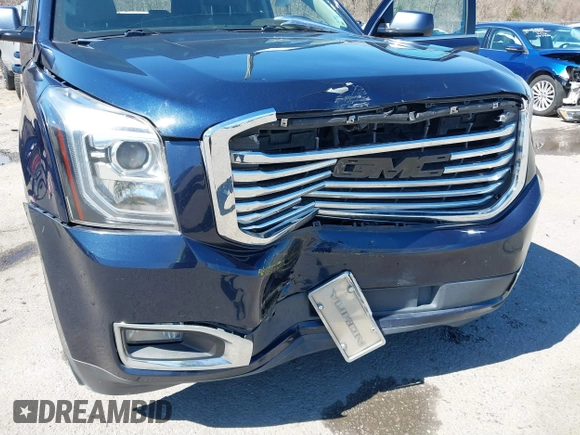 2017 GMC Yukon SLT with VIN 1GKS1BKC9HR356600, listed as a IAAI auction lot 41694218 with 155,855 mi miles. Bid and sale history available at carsss.com. Image 6.