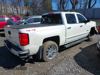 2014 Chevrolet Silverado 1500 High Country with VIN 3GCUKTEJ7EG372338, listed as a IAAI auction lot 41849096 with 69,010 mi miles and . Bid and sale history available at DreamBid. Image 4.