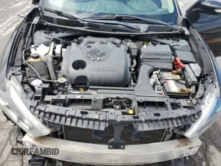 2017 Nissan Maxima SL with VIN 1N4AA6AP4HC424958, listed as a Copart auction lot 57298725 with 127,485 mi miles and Salvage title. Bid and sale history available at DreamBid. Image 11.
