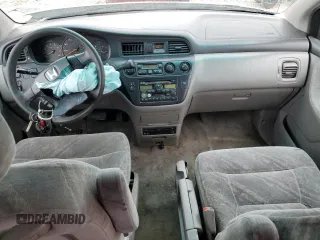 2004 Honda Odyssey EX-RES z VIN 5FNRL18804B121844, wystawiony jako Copart lot #53390135 z przebiegiem 284 065 mil mil oraz Szkoda całkowita • Salvage title. Historia ofert i sprzedaży dostępna na DreamBid. Obrazek 8.