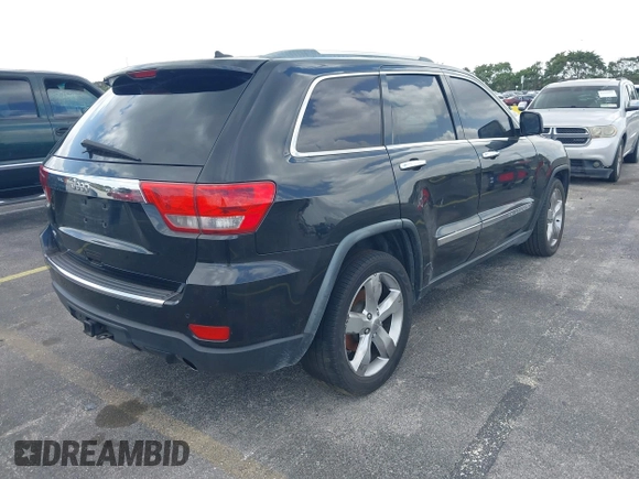 2012 Jeep Grand Cherokee Overland with VIN 1C4RJECT4CC299549, listed as a IAAI auction lot 41917306 with 229,256 mi miles. Bid and sale history available at carsss.com. Image 4.