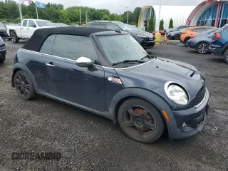 2012 MINI Convertible S z VIN WMWZP3C53CT550188, wystawiony jako Copart lot #88769895 z przebiegiem 130 696 mil mil oraz Nie do naprawy • Non repairable. Historia ofert i sprzedaży dostępna na DreamBid. Obrazek 4.