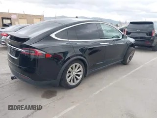 2017 Tesla Model X 90D with VIN 5YJXCAE2XHF075341, listed as a IAAI auction lot 41784008 with 77,439 mi miles and . Bid and sale history available at DreamBid. Image 4.