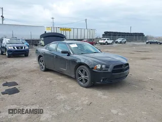 2014 Dodge Charger SXT Plus with VIN 2C3CDXJG2EH184239, listed as a IAAI auction lot 41912384 with 128,313 mi miles. Bid and sale history available at carsss.com. Image 1.