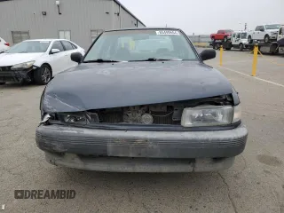 1992 Nissan Sentra E с VIN JN1EB31P1NU104691, выставлен на аукционе Copart как лот 85499664 с пробегом 237 778 миль миль и Списание • Salvage title. История ставок и продаж доступна на DreamBid. Изображение 5.