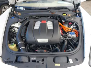 2014 Porsche Panamera S E-Hybrid with VIN WP0AD2A76EL044722, listed as a IAAI auction lot 40716615 with 52,474 mi miles and . Bid and sale history available at DreamBid. Image 10.