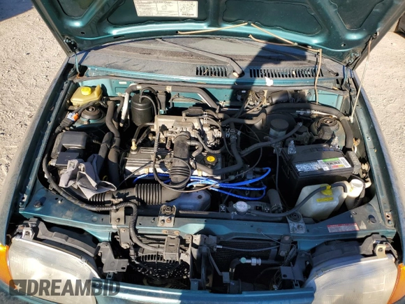 1996 Ford Aspire z VIN KNJLT06H0T6195551, wystawiony jako Copart lot #79450694 z przebiegiem 887 992 mil mil oraz Czysty tytuł • Clean title. Historia ofert i sprzedaży dostępna na DreamBid. Obrazek 11.