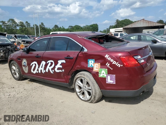 2016 Ford Police Interceptor with VIN 1FAHP2MT3GG142039, listed as a Copart auction lot 53619695 with 59,236 mi miles and Salvage title. Bid and sale history available at DreamBid. Image 2.