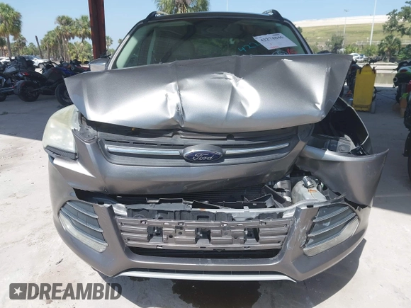 2014 Ford Escape SE z VIN 1FMCU0G97EUE34174, wystawiony jako IAAI lot #42274846 z przebiegiem 121 801 mil mil oraz . Historia ofert i sprzedaży dostępna na DreamBid. Obrazek 6.