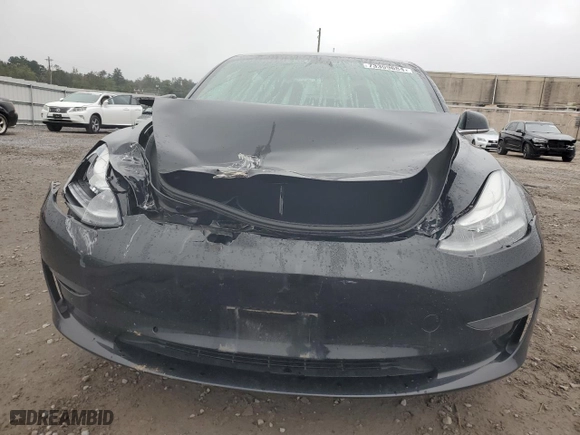 2020 Tesla Model 3 Standard Range Plus with VIN 5YJ3E1EA0LF704405, listed as a Copart auction lot 73399684 with 91,433 mi miles and Salvage Title. Bid and sale history available at carsss.com. Image 5.