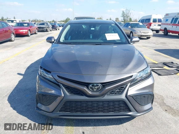 2023 Toyota Camry SE with VIN 4T1G11AK1PU809099, listed as a IAAI auction lot 41450292 with 128,099 mi miles. Bid and sale history available at carsss.com. Image 12.
