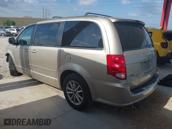 2014 Dodge Grand Caravan SXT with VIN 2C4RDGCG8ER244201, listed as a IAAI auction lot 42017091 with 161,653 mi miles and . Bid and sale history available at DreamBid. Image 15.