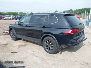 2023 Volkswagen Tiguan SE with VIN 3VVMB7AXXPM003447, listed as a IAAI auction lot 42566061 with 39,185 mi miles and . Bid and sale history available at DreamBid. Image 3.