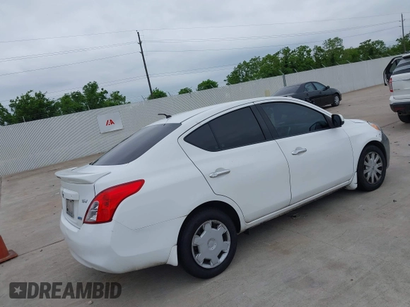 2014 Nissan Versa SV with VIN 3N1CN7AP9EL809772, listed as a IAAI auction lot 42199651 with 163,102 mi miles. Bid and sale history available at carsss.com. Image 4.