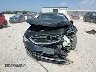 2018 Buick LaCrosse Premium с VIN 1G4ZR5SZ2JU119003, выставлен на аукционе Copart как лот 64390025 с пробегом Не указан миль и Списание • Salvage title. История ставок и продаж доступна на DreamBid. Изображение 13.