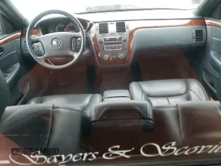 2006 Cadillac DTS Professional z VIN 1GEEH06Y56U500692, wystawiony jako Copart lot #56546565 z przebiegiem 26 810 mil mil oraz Szkody całkowita. Historia ofert i sprzedaży dostępna na DreamBid. Obrazek 8.
