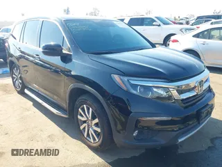 2019 Honda Pilot EX-L with VIN 5FNYF5H50KB042851, listed as a IAAI auction lot 41297072 with 101,796 mi miles and . Bid and sale history available at carsss.com. Image 1.