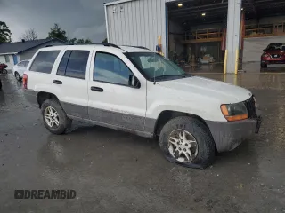 2004 Jeep Grand Cherokee Laredo z VIN 1J4GW48S74C165732, wystawiony jako Copart lot #56316885 z przebiegiem 177 139 mil mil oraz Szkoda całkowita • Salvage title. Historia ofert i sprzedaży dostępna na DreamBid. Obrazek 4.