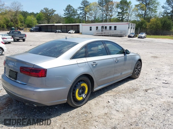 2016 Audi A6 Premium z VIN WAUCFAFC2GN111968, wystawiony jako IAAI lot #42003738 z przebiegiem 149 089 mil mil oraz . Historia ofert i sprzedaży dostępna na DreamBid. Obrazek 4.
