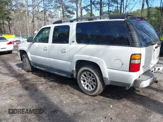 2004 Chevrolet Suburban Z71 with VIN 3GNFK16Z54G314817, listed as a IAAI auction lot 41613299 with 360,310 mi miles. Bid and sale history available at carsss.com. Image 3.