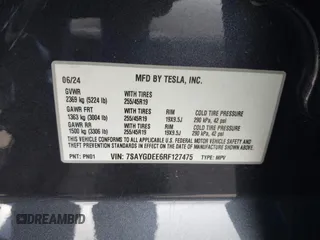 2024 Tesla Model Y Long Range with VIN 7SAYGDEE6RF127475, listed as a IAAI auction lot 41919580 with 19,395 mi miles. Bid and sale history available at carsss.com. Image 9.