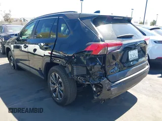 2024 Toyota RAV4 Hybrid XLE Premium with VIN JTMB6RFV0RD126685, listed as a IAAI auction lot 41870692 with 21,637 mi miles. Bid and sale history available at carsss.com. Image 3.
