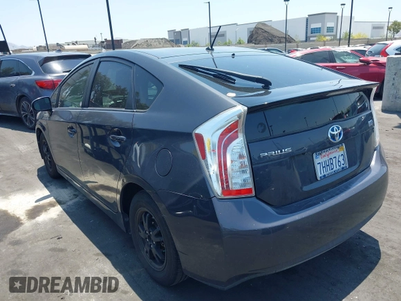 2015 Toyota Prius Four with VIN JTDKN3DUXF0401038, listed as a IAAI auction lot 42461797 with 142,302 mi miles and . Bid and sale history available at DreamBid. Image 3.
