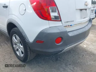 2014 Chevrolet Captiva Sport LS z VIN 3GNAL2EK7ES547033, wystawiony jako IAAI lot #42206186 z przebiegiem 196 530 mil mil oraz . Historia ofert i sprzedaży dostępna na DreamBid. Obrazek 6.