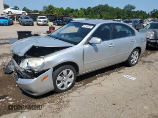 2007 Kia Optima LX z VIN KNAGE123575130184, wystawiony jako Copart lot #62146045 z przebiegiem 172 432 mil mil oraz Szkoda całkowita • Salvage title. Historia ofert i sprzedaży dostępna na DreamBid. Obrazek 1.