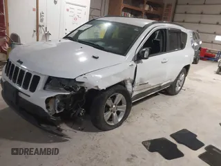 2012 Jeep Compass Latitude with VIN 1C4NJDEB0CD676725, listed as a IAAI auction lot 41948874 with 143,833 mi miles. Bid and sale history available at carsss.com. Image 2.