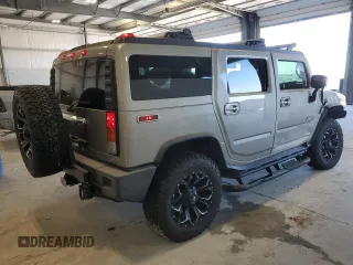 2003 Hummer H2 with VIN 5GRGN23U73H142618, listed as a Copart auction lot 89116505 with 28,597 mi miles and Salvage Title. Bid and sale history available at carsss.com. Image 3.