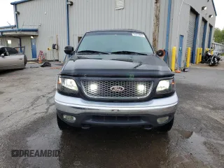 1999 Ford F-150 z VIN 2FTRX08WXXCA60270, wystawiony jako Copart lot #51913935 z przebiegiem Nie podano mil oraz Szkoda całkowita • Salvage title. Historia ofert i sprzedaży dostępna na DreamBid. Obrazek 5.