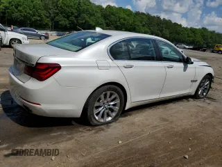 2014 BMW 7 Series 740i z VIN WBAYA6C51ED144132, wystawiony jako Copart lot #55131365 z przebiegiem 116 826 mil mil oraz Szkoda całkowita • Salvage title. Historia ofert i sprzedaży dostępna na DreamBid. Obrazek 3.