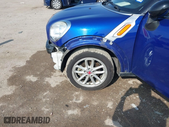 2015 MINI Countryman with VIN WMWZB3C56FWR43443, listed as a IAAI auction lot 41920848 with 91,192 mi miles and . Bid and sale history available at DreamBid. Image 6.