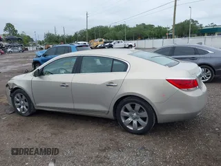 2011 Buick LaCrosse CXS with VIN 1G4GE5ED4BF301990, listed as a IAAI auction lot 41987714 with 144,554 mi miles and . Bid and sale history available at DreamBid. Image 14.