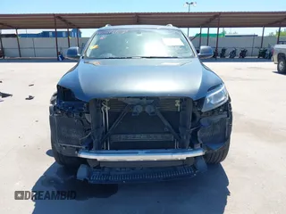2015 Audi Q7 Premium Plus with VIN WA1LGAFE7FD002275, listed as a IAAI auction lot 42314167 with 144,291 mi miles and . Bid and sale history available at DreamBid. Image 13.