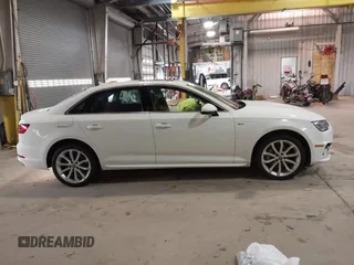 2019 Audi A4 Premium with VIN WAUDNAF47KA117328, listed as a IAAI auction lot 41634062 with 126,067 mi miles and . Bid and sale history available at DreamBid. Image 14.
