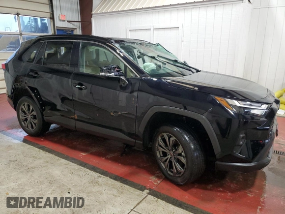 2023 Toyota RAV4 Hybrid XLE Premium with VIN 4T3B6RFV4PU121604, listed as a Copart auction lot 49998145 with 52,573 mi miles and Salvage Title. Bid and sale history available at carsss.com. Image 4.