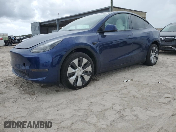 2023 Tesla Model Y Long Range z VIN 7SAYGDEE5PF787794, wystawiony jako Copart lot #55212605 z przebiegiem 30 277 mil mil oraz Szkoda całkowita • Salvage title. Historia ofert i sprzedaży dostępna na DreamBid. Obrazek 1.