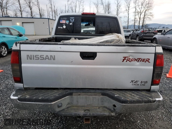 2000 Nissan Frontier XE z VIN 1N6ED27Y8YC368144, wystawiony jako Copart lot #87784565 z przebiegiem Nie podano mil oraz Czysty tytuł • Clean title. Historia ofert i sprzedaży dostępna na DreamBid. Obrazek 6.