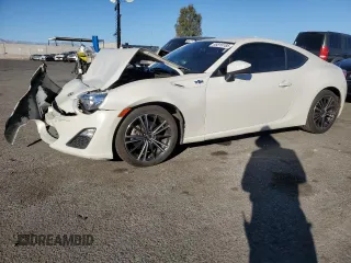 2016 Scion FR-S with VIN JF1ZNAA15G8702077, listed as a Copart auction lot 88819185 with 57,194 mi miles and Salvage Title. Bid and sale history available at carsss.com. Image 1.