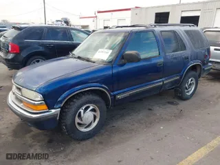 1999 Chevrolet Blazer LS with VIN 1GNDT13W0X2223207, listed as a IAAI auction lot 41352241 with 239,263 mi miles. Bid and sale history available at carsss.com. Image 2.