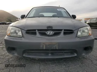 2001 Hyundai Accent GL with VIN KMHCG35C81U141661, listed as a Copart auction lot 84124804 with 38,318 mi miles and Clean Title. Bid and sale history available at carsss.com. Image 5.