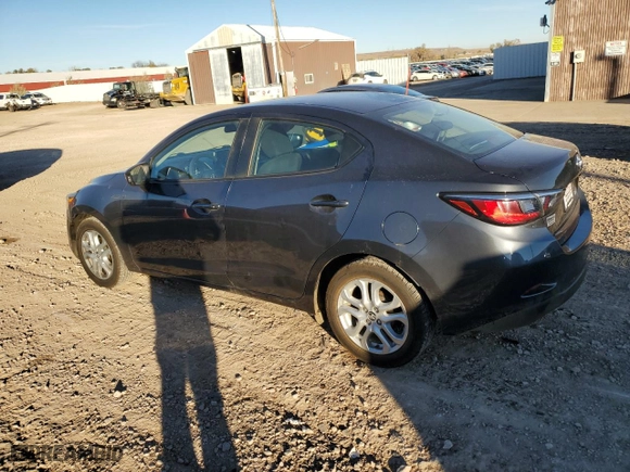 2017 Toyota Yaris iA with VIN 3MYDLBYV4HY153133, listed as a Copart auction lot 79131944 with 132,514 mi miles and Salvage Title. Bid and sale history available at carsss.com. Image 2.