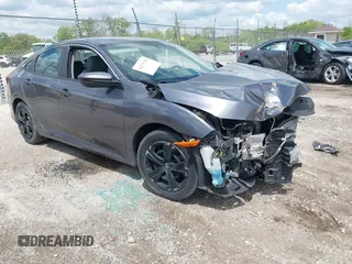 2017 Honda Civic LX with VIN 19XFC2F58HE003585, listed as a IAAI auction lot 42371759 with 77,261 mi miles and . Bid and sale history available at DreamBid. Image 1.