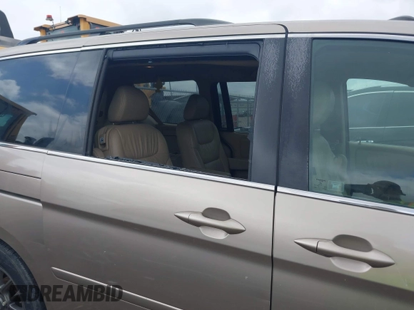 2007 Honda Odyssey EX-L z VIN 5FNRL38717B102646, wystawiony jako IAAI lot #42380196 z przebiegiem 234 088 mil mil oraz . Historia ofert i sprzedaży dostępna na DreamBid. Obrazek 14.
