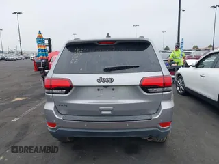 2016 Jeep Grand Cherokee Laredo z VIN 1C4RJFAG3GC457431, wystawiony jako IAAI lot #41993167 z przebiegiem 61 427 mil mil oraz . Historia ofert i sprzedaży dostępna na DreamBid. Obrazek 16.