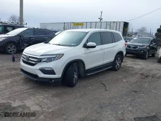 2016 Honda Pilot EX-L with VIN 5FNYF6H57GB014025, listed as a IAAI auction lot 41614794 with 133,824 mi miles. Bid and sale history available at carsss.com. Image 2.