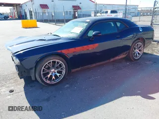 2013 Dodge Challenger R/T z VIN 2C3CDYBT7DH679522, wystawiony jako IAAI lot #41387221 z przebiegiem 122 147 mil mil oraz . Historia ofert i sprzedaży dostępna na DreamBid. Obrazek 2.