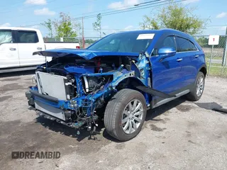 2023 Cadillac XT4 FWD Premium Luxury with VIN 1GYFZCR43PF104796, listed as a IAAI auction lot 41931695 with 12,666 mi miles. Bid and sale history available at carsss.com. Image 2.